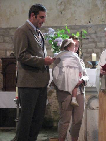 A l'glise, le baptme